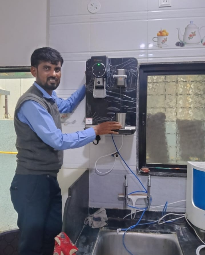 Technician completing professional RO installation